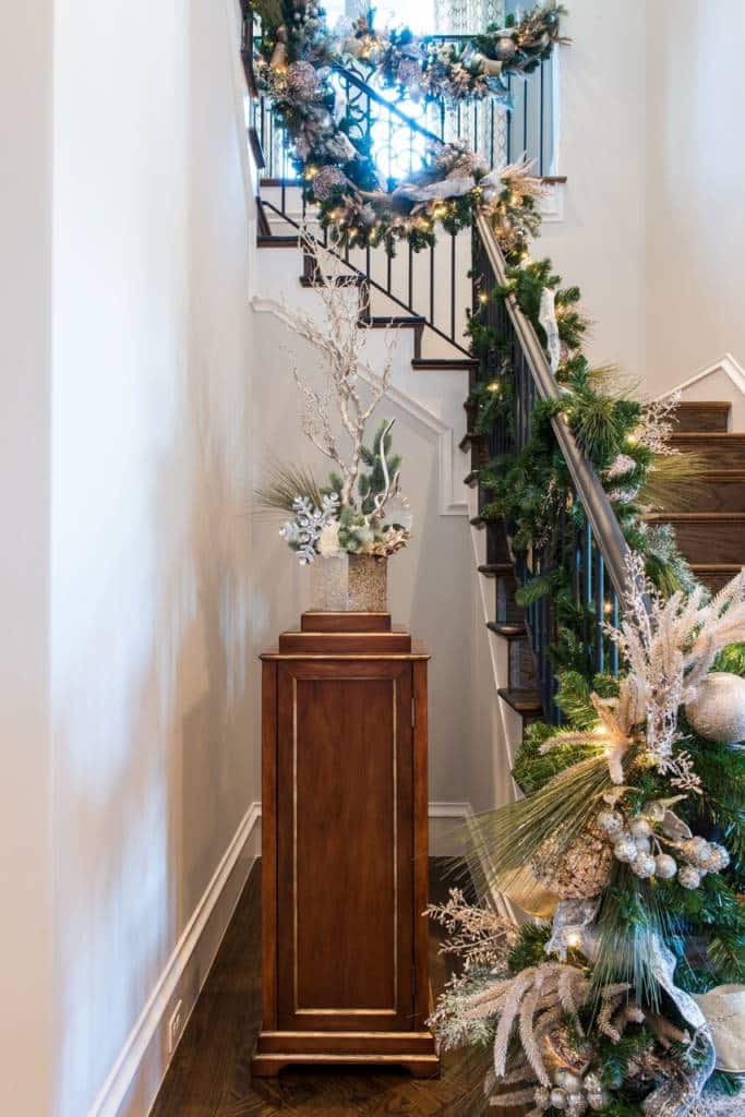 white flocked christmas tree interior design dallas stairwell